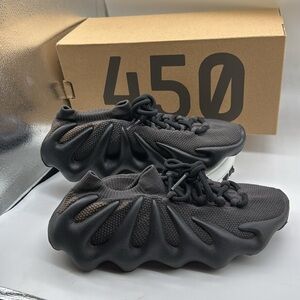 Yeezy 450’s in black, size 7, fits size women’s US 8